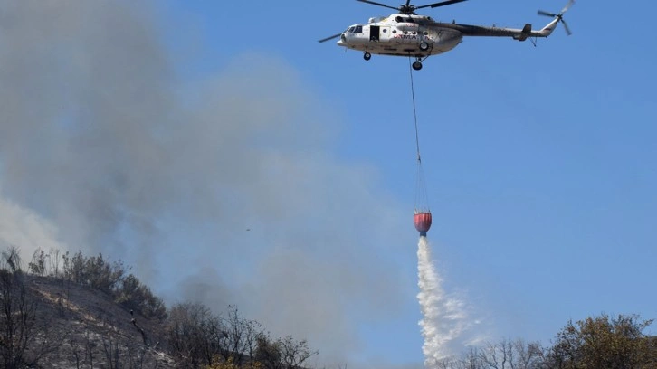 Tarım arazisinden ormana sıçradı! Helikopterler, uçaklar bölgede...