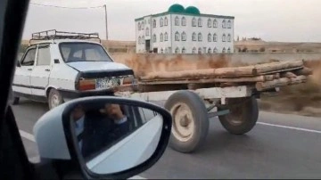 Adıyaman'da ilginç görüntü, trafikte otomobil at arabasını çekti