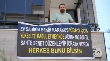 Ev sahibinin senetli kumpasına kiracıdan pankartlı tepki