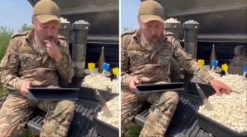 Ukrayna askerleri Rusya'daki darbe girişimini patlamış mısır yiyerek takip ediyor